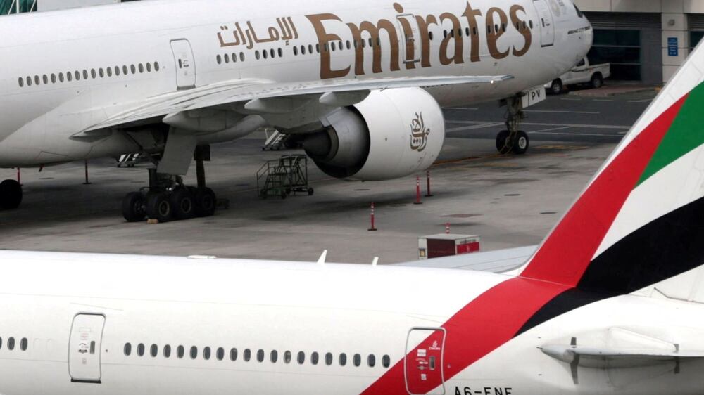 FILE PHOTO: Emirates Airline Boeing 777-300ER planes are seen at Dubai International Airport in Dubai, United Arab Emirates, February 15, 2019.  REUTERS / Christopher Pike / File Photo