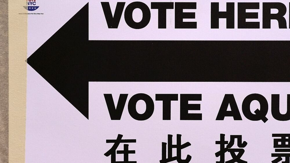 A "Vote Here" sign is displayed on election day in the Manhattan borough of New York City, New York, U. S. , November 2, 2021.  REUTERS / Carlo Allegri