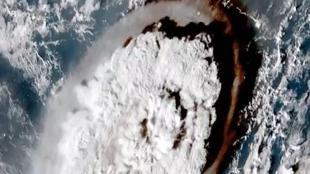 Tonga issues tsunami warning after undersea volcano erupts