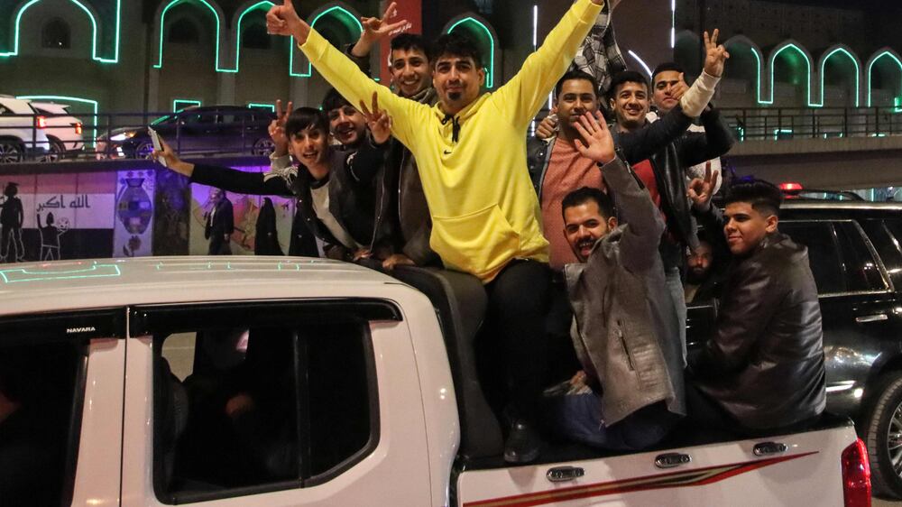 Fans celebrate Iraq’s win over Qatar in Gulf Cup