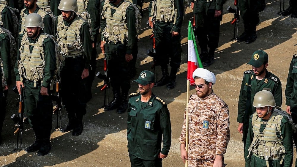 FILE PHOTO: Members of the Islamic Revolutionary Guard Corps (IRGC) attend an IRGC ground forces military drill in the Aras area, East Azerbaijan province, Iran, October 17, 2022.  IRGC / WANA (West Asia News Agency) / Handout via REUTERS / File Photo