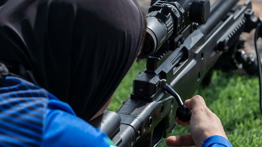 Dubai Police all female SWAT team practise at the Dubai Police SWAT grounds.
Team Sniper Lt Latifa Al Salman practising with her police issue sniper rifle.
Antonie Robertson/The National


