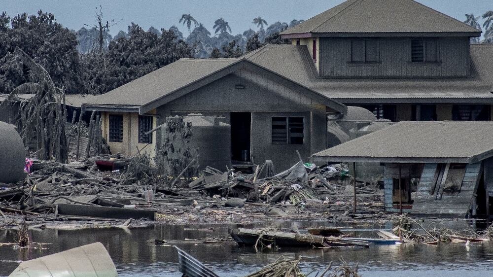 A general view shows damaged buildings following volcanic eruption and tsunami in Nomuka, Tonga, January 17, 2022 in this picture obtained from social media.  Picture taken January 17, 2022.  Malau Media/via REUTERS  ATTENTION EDITORS - THIS IMAGE HAS BEEN SUPPLIED BY A THIRD PARTY.  MANDATORY CREDIT