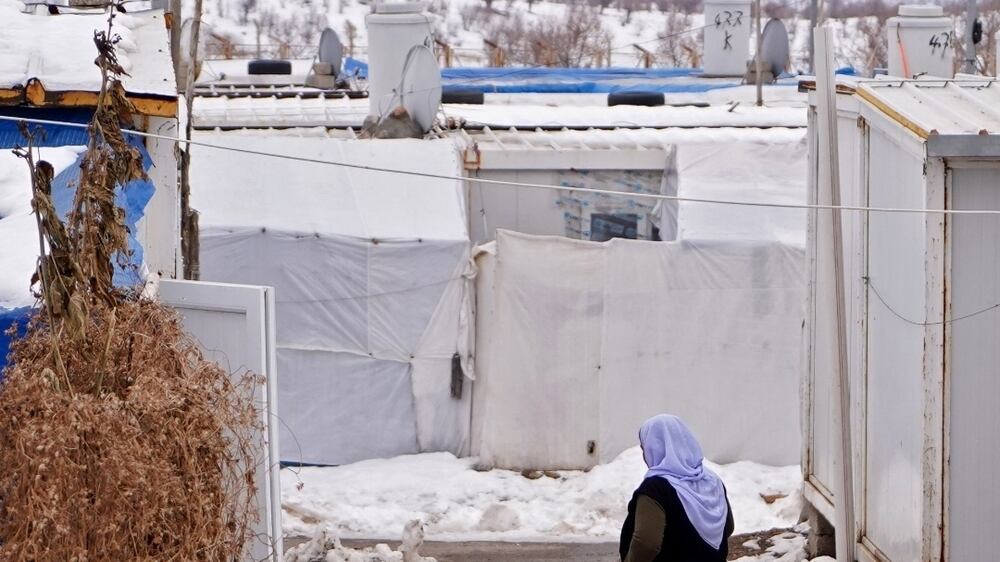 Snow covers camp for displaced Yazidis