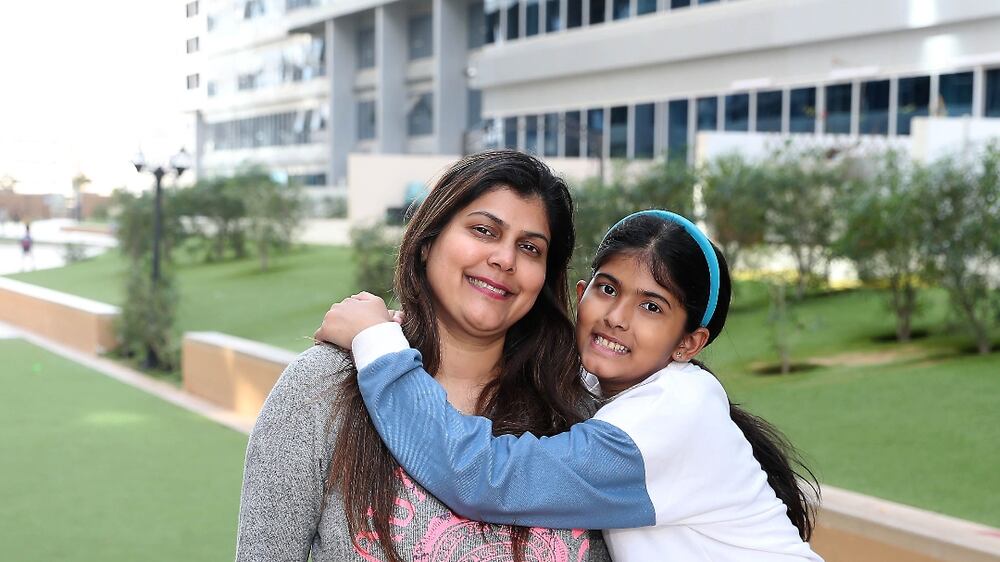 Alison Rego with her daughter Kristen lives in the  1BHK apartment at the Skycourts tower D in Dubailand in Dubai. She pays Dh33,000 rent for this apartment. Pawan Singh / The National