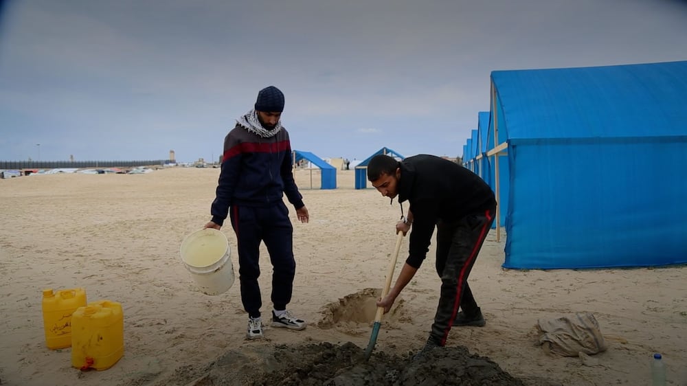 Gazans build makeshift toilets for overcrowded camps