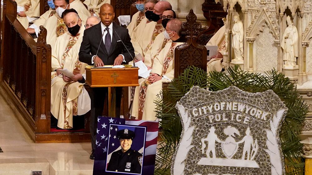 FILE — New York City Mayor Eric Adams addresses mourners during a funeral service for NYPD Officer Jason Rivera, Jan.  28, 2022, at St.  Patrick's Cathedral in New York.  A string of headline-making violence in New York City has frayed nerves and become a rolling trauma for Mayor Eric Adams' nascent administration.  (AP Photo / Mary Altaffer, POOL, File)