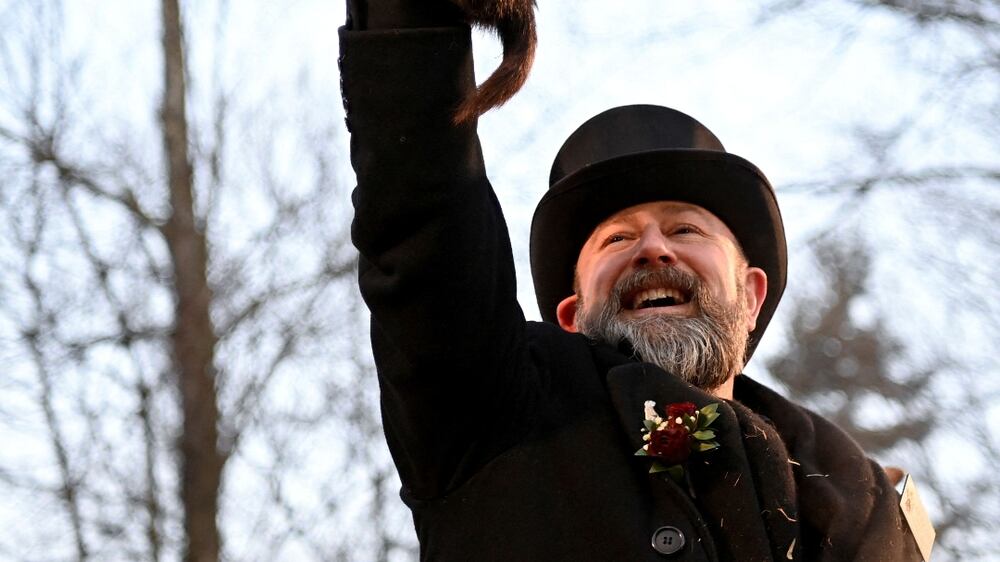 AJ Dereume holds up Phil the groundhog as he is to make his prediction on how long winter will last during the Groundhog Day Festivities, at Gobblers Knob in Punxsutawney, Pennsylvania, U. S. , February 2, 2023.  REUTERS / Alan Freed     TPX IMAGES OF THE DAY