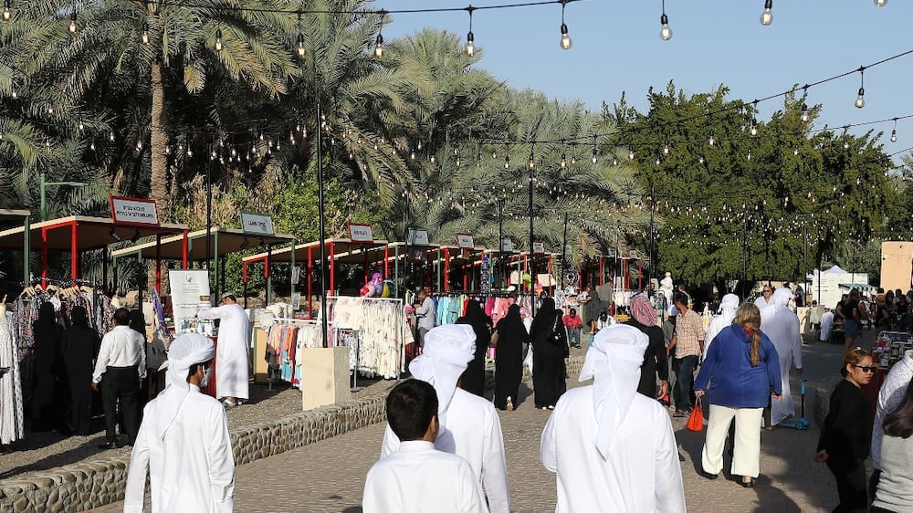 People visit the Saturday Market at Al Ain Oasis. Al Ain, Abu Dhabi. Chris Whiteoak / The National