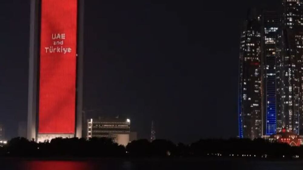Abu Dhabi's Adnoc building lights up with the Turkish flag for Erdogan's visit