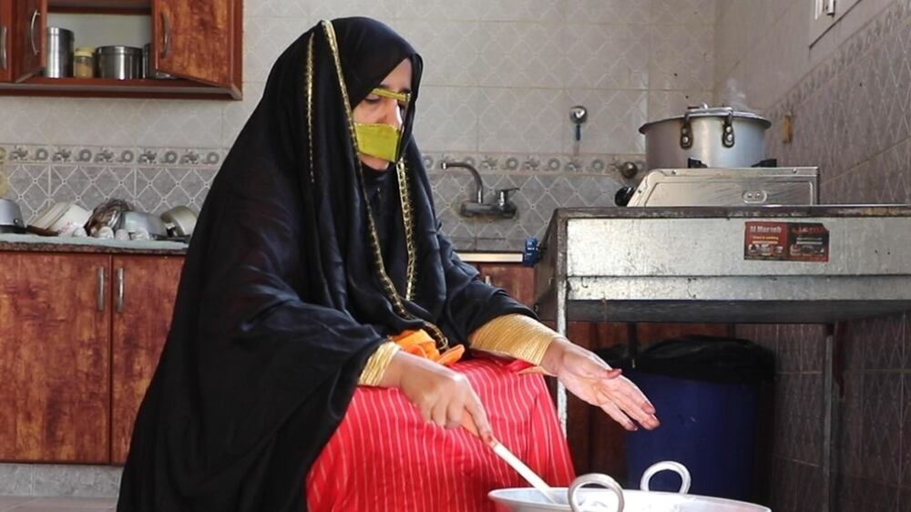 Emirati women prepare traditional food to showcase UAE's heritage