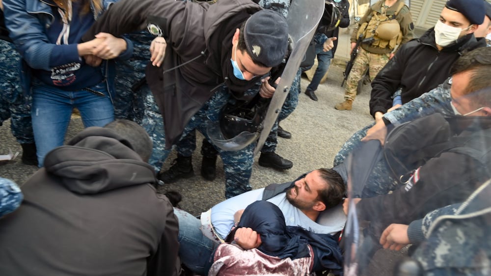 Lebanese depositors storm bank in protest