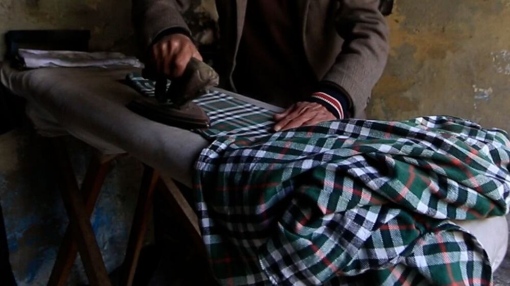 Meet northern Syria’s last old-fashioned laundry ironer