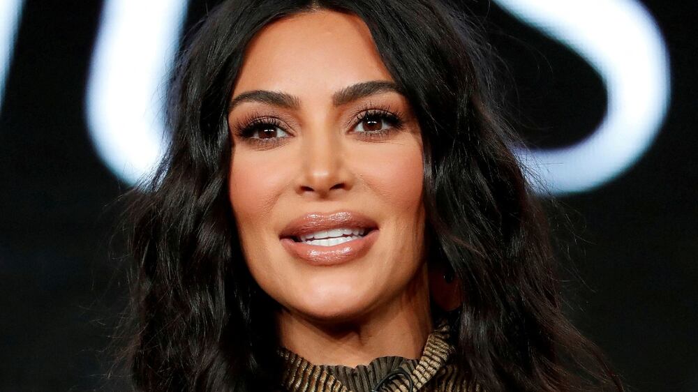 Kim Kardashian shines in snake skin print at Dolce & Gabbana dinner