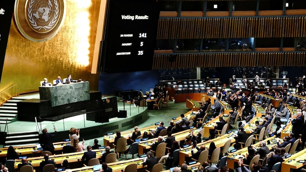 Delegates react as results of the voting are displayed during the 11th emergency special session of the 193-member U. N.  General Assembly on Russia's invasion of Ukraine, at the United Nations Headquarters in Manhattan, New York City, U. S. , March 2, 2022.  REUTERS / Carlo Allegri