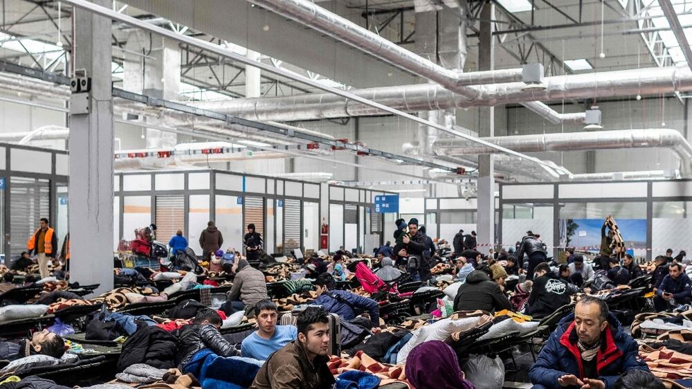 Thousands of refugees from Ukraine take shelter inside a Polish hangar