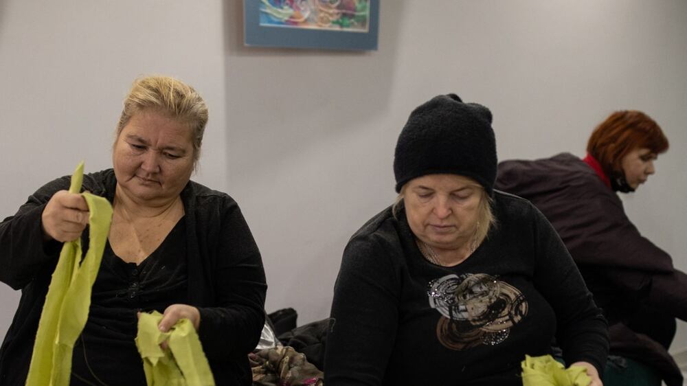 UKRAINE: Monday 28 February 
Two Ukrainian women cut and sort green fabric to make camouflage webbing in a children’s community centre in Lviv, Ukraine. An army of volunteers has mobilised across the country to aid the war effort.

Oliver Marsden for The National