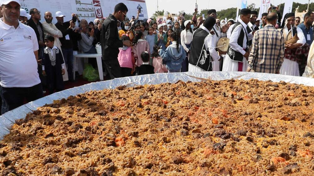 Libyan chefs cook up giant couscous