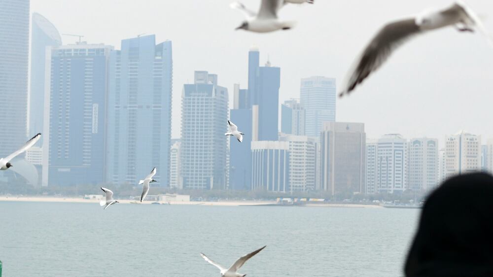 Overcast skies along Corniche in the capital, Abu Dhabi. Khushnum Bhandari / The National