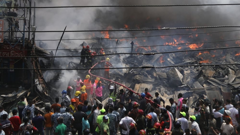 Huge fire engulfs clothing market in Bangladesh