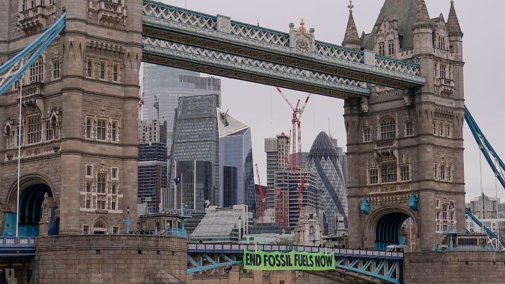 Tower Bridge in London closed after Extinction Rebellion launches protest