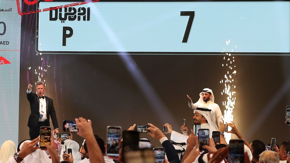 Dubai special car number plate 7 sold for 55 millions AED in the charity auction in aid of One Billion Meals Endowment campaign held at Four Seasons Resort Dubai at Jumeirah Beach in Dubai. Pawan Singh / The National 