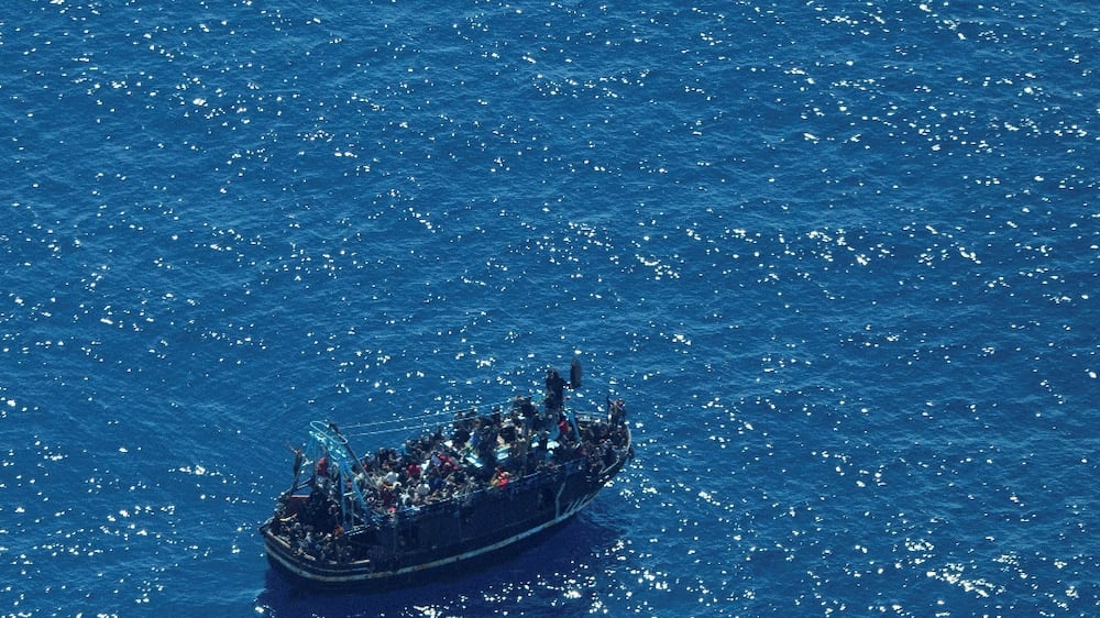The boat in distress with about 400 people on board is pictured in Central Mediterranean in this handout obtained by Reuters on April 10, 2023.  Giacomo Zorzi/ Sea-Watch/Handout via REUTERS    THIS IMAGE HAS BEEN SUPPLIED BY A THIRD PARTY.  NO RESALES.  NO ARCHIVES. 