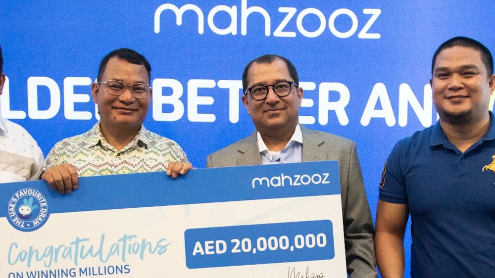 Farid Samji, CEO of EWINGS, managing operator of Mahzooz with (L-R) Aboobaker, Indian expat who won 400gms of gold, Padam, Nepali expat who won 20million, and Sherlon, Filipino expat who won 1million draw during the presscon at Mahzooz Dh20million winner at Mahzooz Headquarters, Dubai. Ruel Pableo for The National