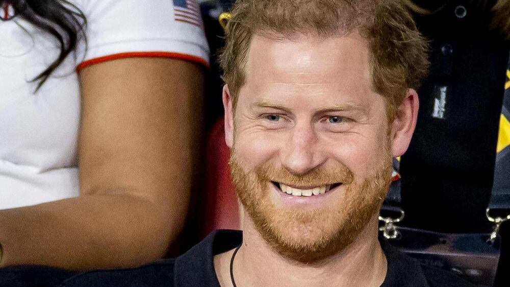 UK's Prince Harry cycles through the Invictus Games park