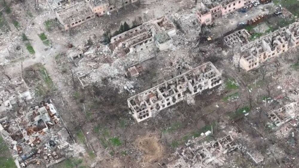 An aerial view shows damaged buildings, amid Russia's ongoing invasion of Ukraine, in Mariupol, Ukraine in this handout picture taken with a drone released April 24, 2022.  Azov/Handout via REUTERS  THIS IMAGE HAS BEEN SUPPLIED BY A THIRD PARTY.  MANDATORY CREDIT. 