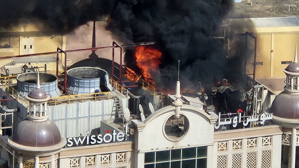 A resident captured this image of a fire on the roof of the Swissotel Al Murooj. Photo: Emad Farid