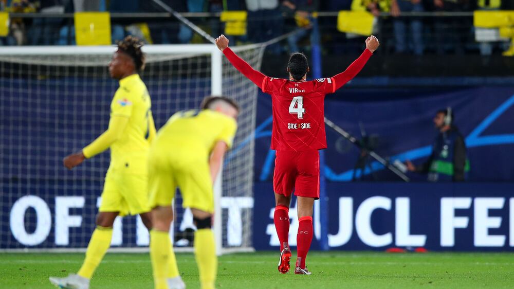 VILLARREAL, SPAIN - MAY 03: Virgil van Dijk of Liverpool celebrates after their sides victory during the UEFA Champions League Semi Final Leg Two match between Villarreal and Liverpool at Estadio de la Ceramica on May 03, 2022 in Villarreal, Spain. (Photo by Eric Alonso / Getty Images)