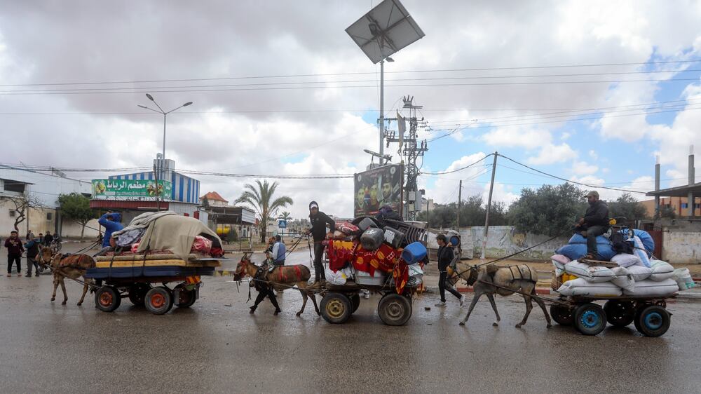 Palestinians start fleeing Rafah as Israeli assault begins