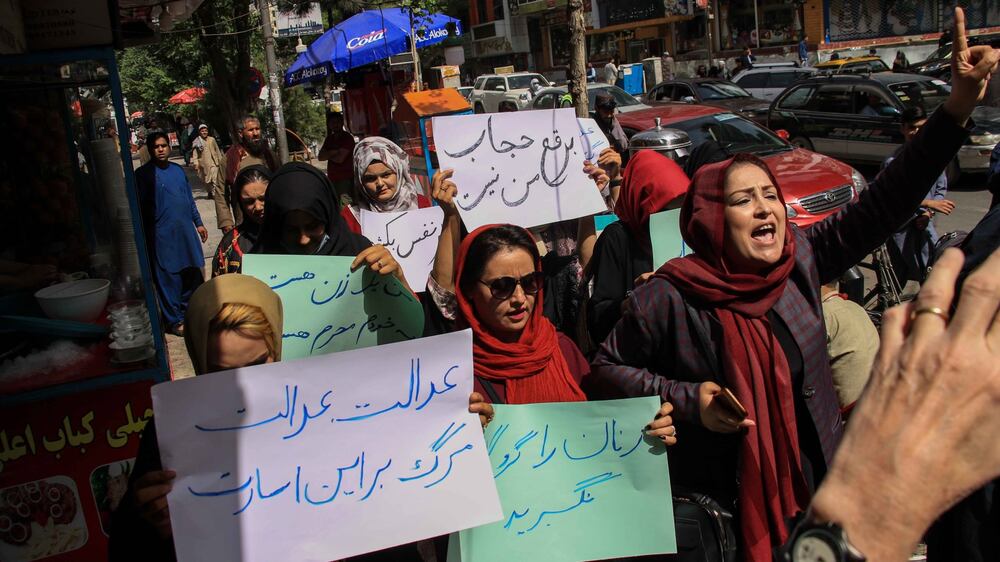 Afghan women protest against Taliban ruling on face coverings