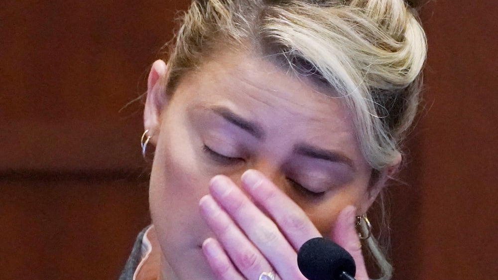 Actor Amber Heard testifies in the courtroom at the Fairfax County Circuit Courthouse in Fairfax, Va. , Monday, May 16, 2022.  Actor Johnny Depp sued his ex-wife Amber Heard for libel in Fairfax County Circuit Court after she wrote an op-ed piece in The Washington Post in 2018 referring to herself as a "public figure representing domestic abuse. " (AP Photo / Steve Helber, Pool)