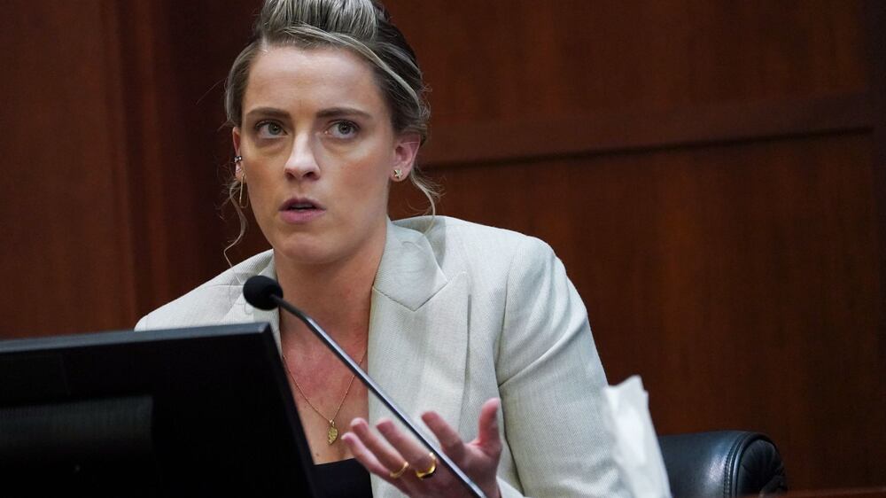 Amber Heard's sister tells trial she was caught in the middle of violence