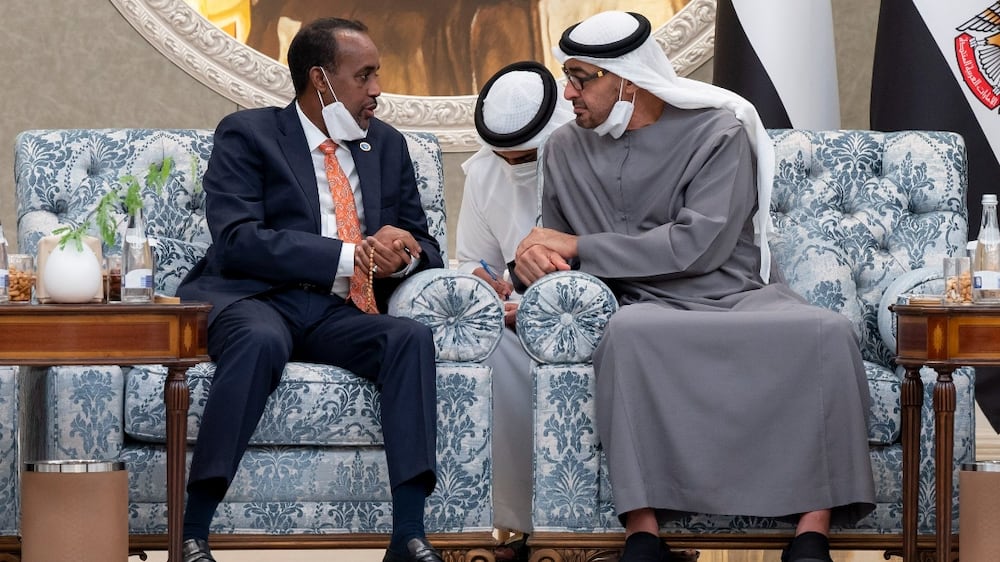 ABU DHABI, UNITED ARAB EMIRATES - May 20, 2022: HE Mohamed Roble, Prime Minister of Somalia (2nd L) and HE Dr Mahamudu Bawumia, Vice President of Ghana (R), offer condolences to HH Sheikh Mohamed bin Zayed Al Nahyan, President of the UAE and Ruler of Abu Dhabi (3rd L), on the death of the late HH Sheikh Khalifa bin Zayed Al Nahyan, President of the United Arab Emirates. Seen at Mushrif Palace.

( Abdulla Al Neyadi for the Ministry of Presidential Affairs )
---