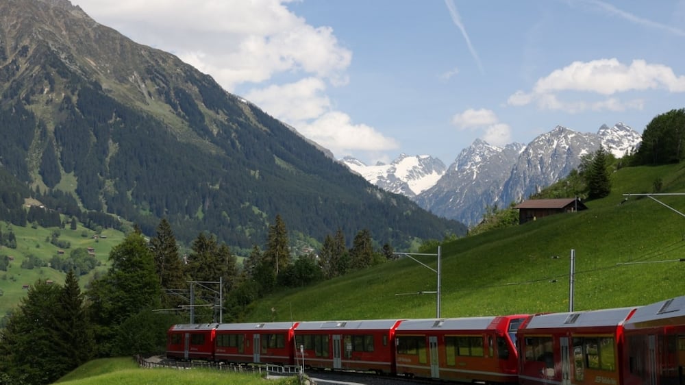 An SBB AG train on its way between towards the town of Davos, ahead of the World Economic Forum (WEF) in Davos, Switzerland, on Saturday, May 21, 2022.  The annual Davos gathering of political leaders, top executives and celebrities runs from May 22 to 26. Photographer: Hollie Adams / Bloomberg