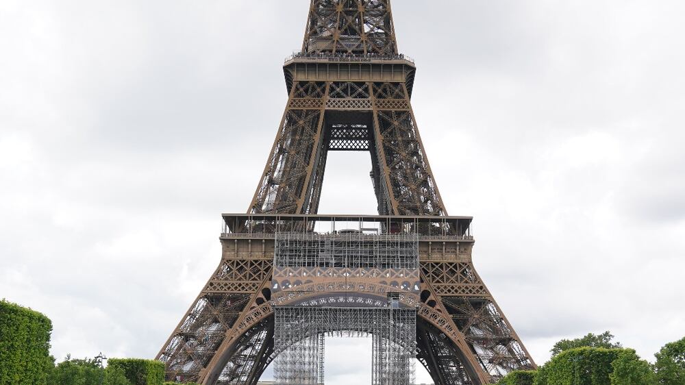 Football fans near the Eiffel Tower in Paris ahead of Saturday's UEFA Champions League Final between Liverpool FC and Real Madrid at the Stade de France, in Paris France. Picture date: Friday May 27, 2022.