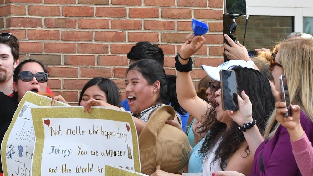 Johnny Depp fans cheer outside court as defamation trial ends