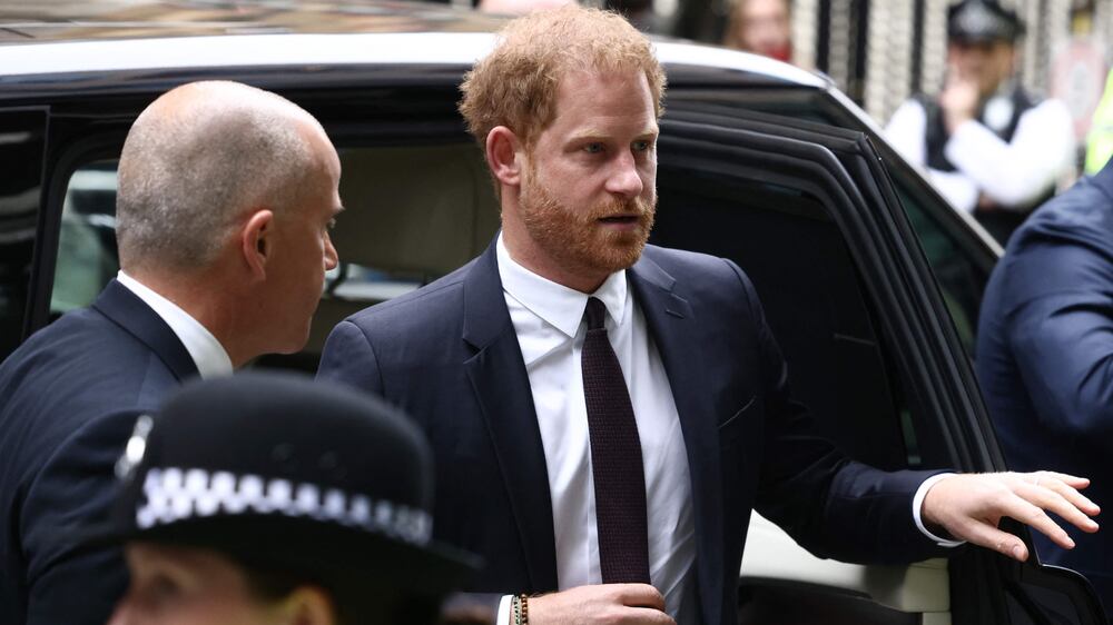 Prince Harry arrives at UK court for rare royal appearance