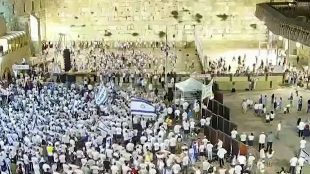 Jewish worshippers celebrate Jerusalem Day as fire erupts near Western Wall