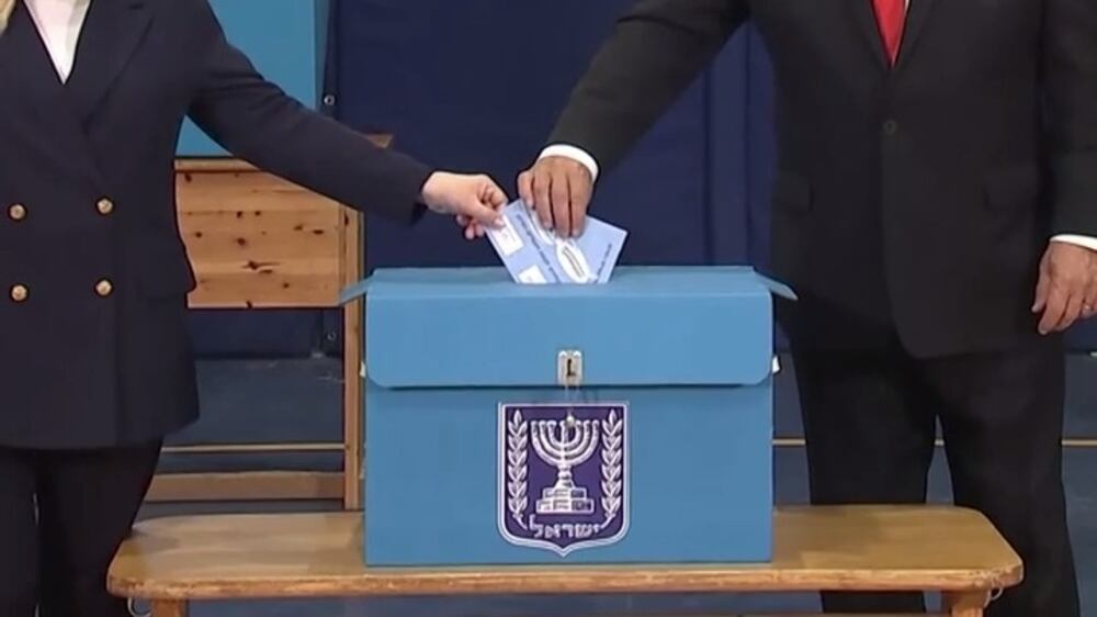 Netanyahu, Lapid cast ballots in Israel's fourth elections in two years