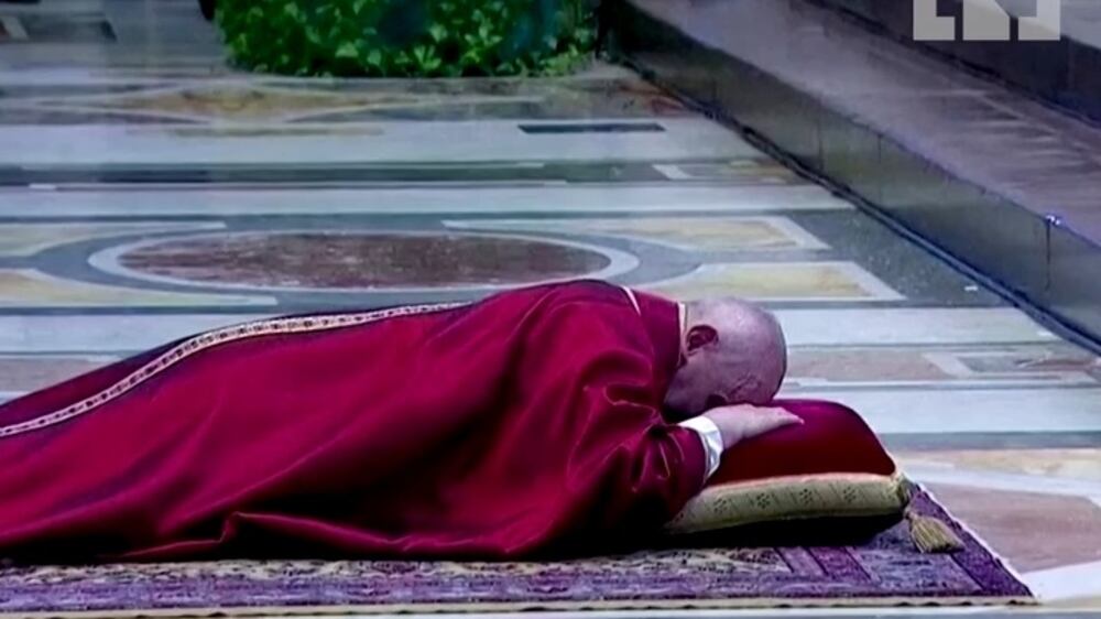 Pope Francis lies on floor of St Peter’s Basilica to pray