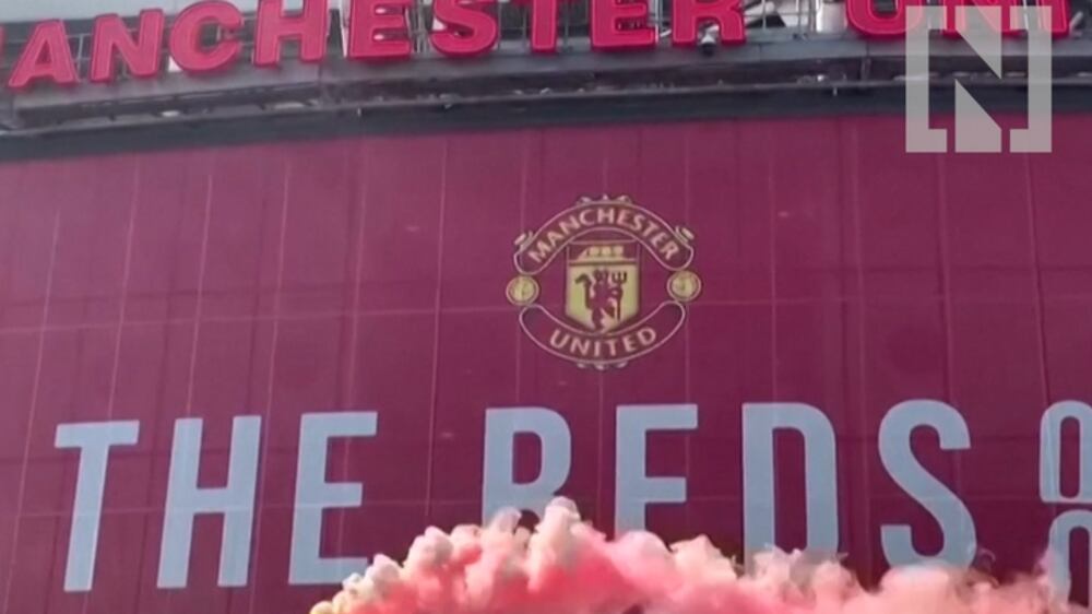 Flares and chants as Manchester United fans protest owners