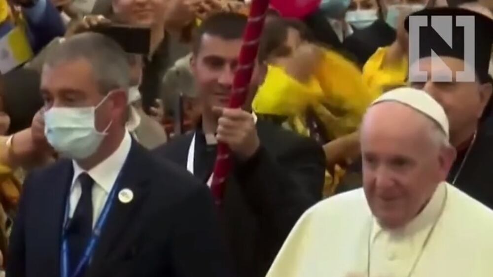 Pope Francis greets enthusiastic crowd as he enters church in Qaraqosh