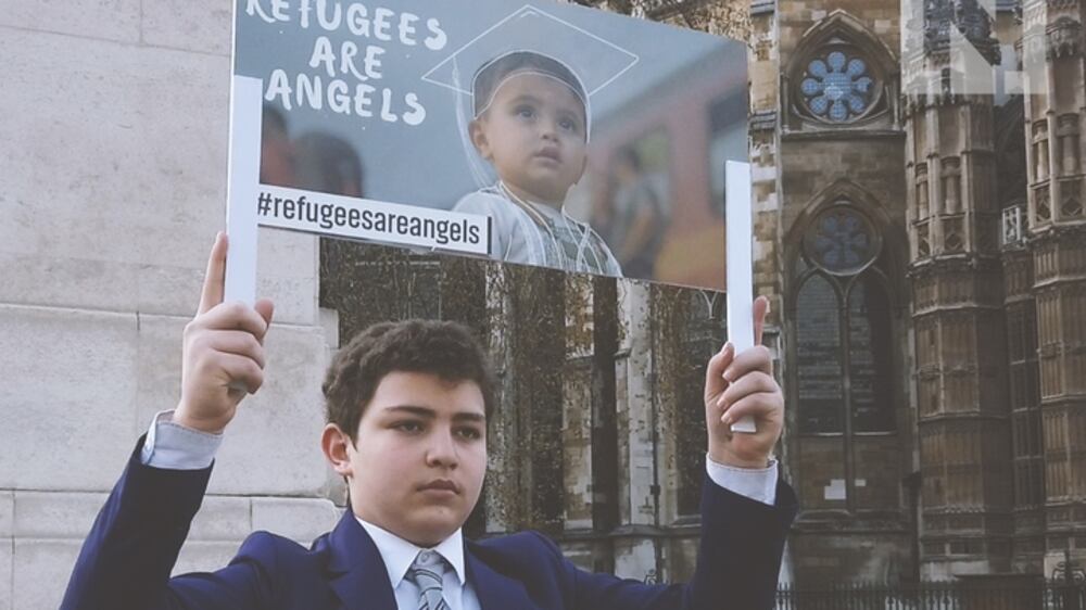 Syrian boy protests outside UK parliament every day during Ramadan over plight of refugees