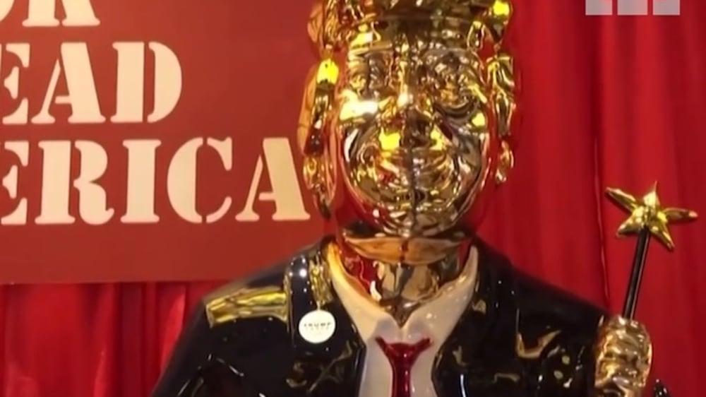 Gold statue of Donald Trump at CPAC
