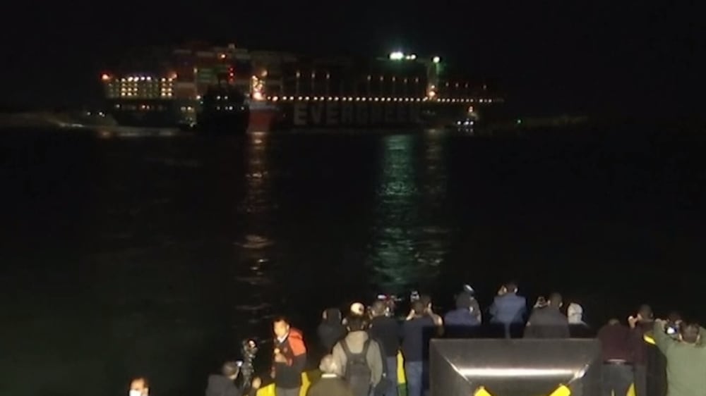 Efforts to free Suez vessel continue through another night 