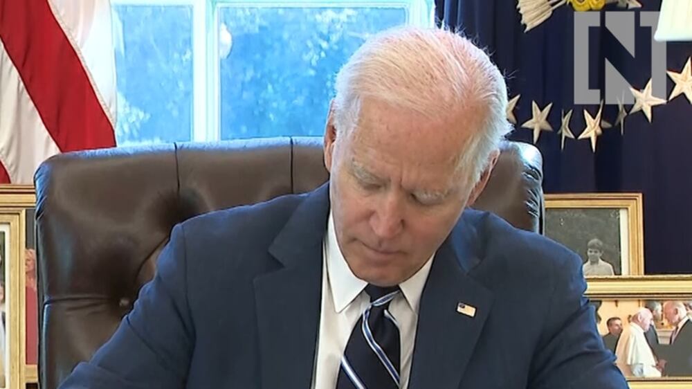 Joe Biden signs into law a $1.9 trillion Covid relief bill